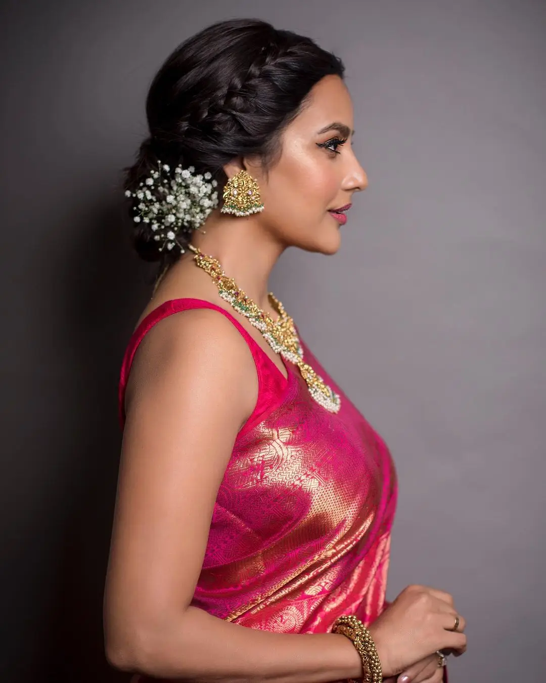 Actress Priya Anand Images in Red Color Saree Sleeveless Blouse